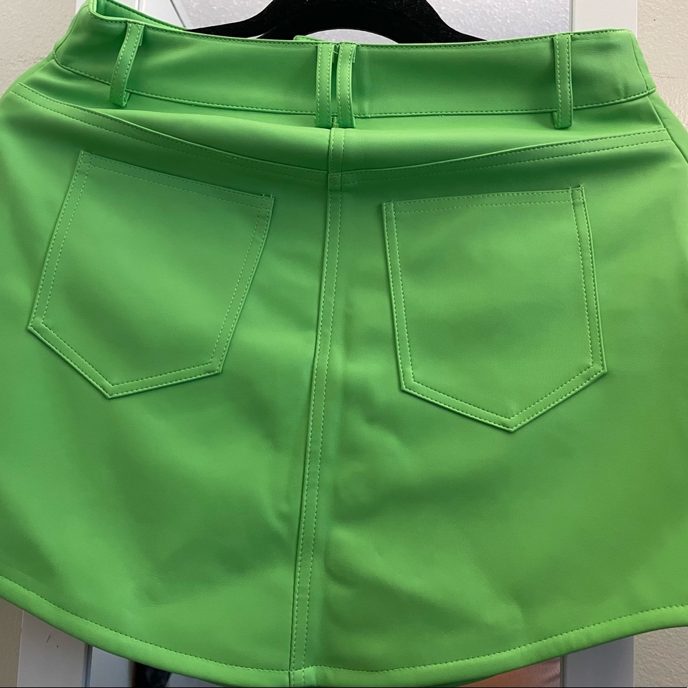 Green faux leather blazer and mini skirt